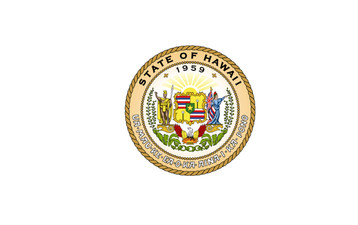 Circular state seal with the motto "Ua Mau ke Ea ‘Aina i ka Pono" (The life of the land is perpetuated in righteousness) at the bottom, the words \"State of Hawaii\" at the top, and in the center, a shield supported by King Kamehameha I and the Goddess of Liberty, with a rising sun, a phoenix, and state symbols below.