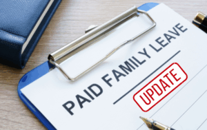 Clipboard with Text "Paid Family Leave - Update (red box)"